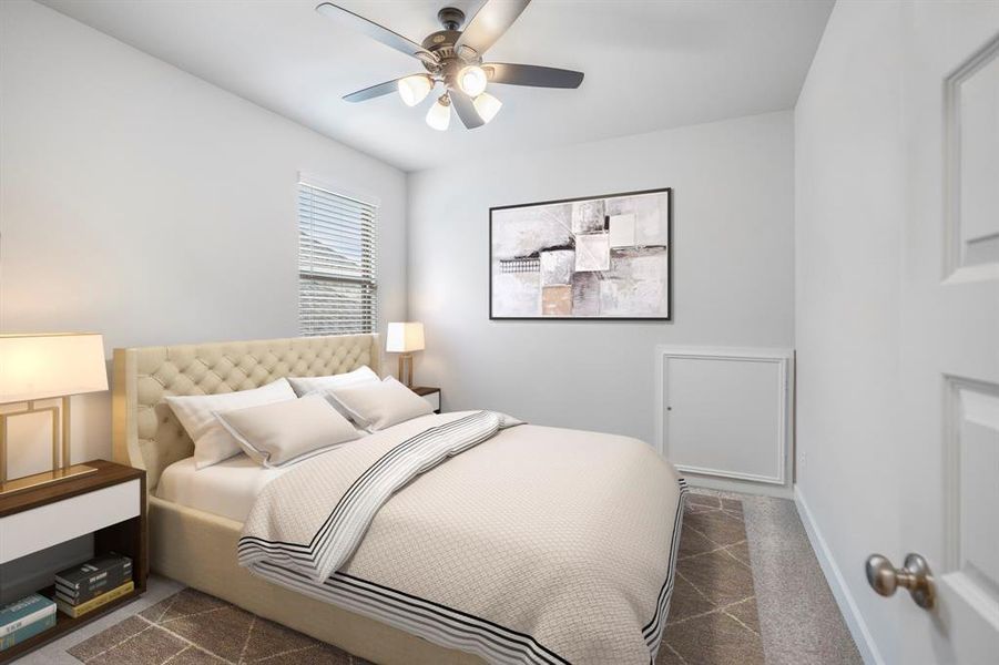 This spacious secondary bedroom features bright natural light, a ceiling fan, plush carpet, and a spacious closet! *This room has been virtually staged