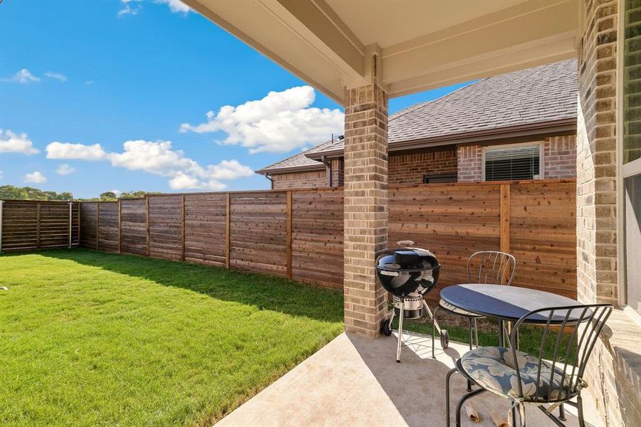 View of yard with a patio area