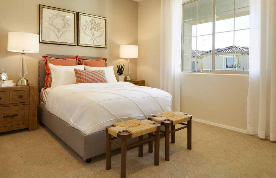 The secondary bedroom offers the flexibility to accommodate a guest living space or a hobby room