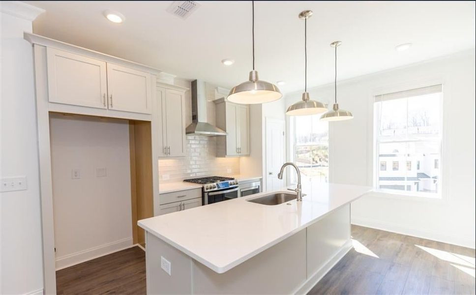 Stunning finishes found in this kitchen!  Photo not of actual home but of previously built TPG property.