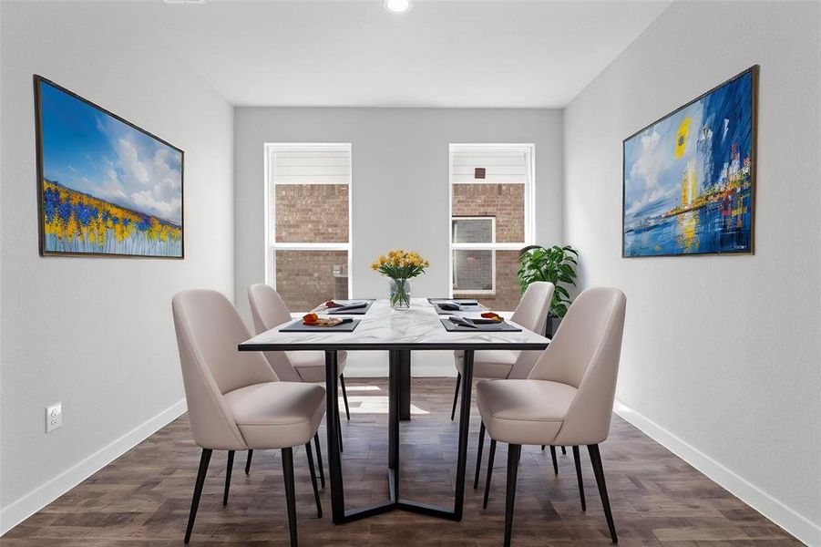 You and your guests will certainly dine in style in this amazing formal dining room! Featuring large windows with blinds, neutral paint, high ceilings, and tile flooring! Perfect space to entertain family and friends!