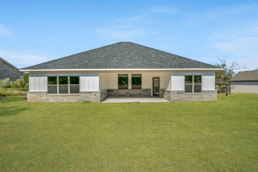 Rear view of house with a patio area