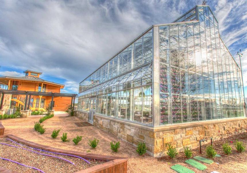 Glass walls and vertical gardens set the tone for memorable gatherings, from weddings to wine and cheese parties. The conservatory is available for residents to host events.