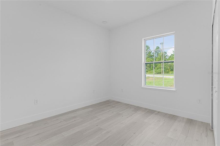 Bedroom 2 with window looking toward the front yard