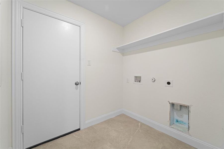 Laundry area featuring gas dryer hookup, hookup for a washing machine, and electric dryer hookup