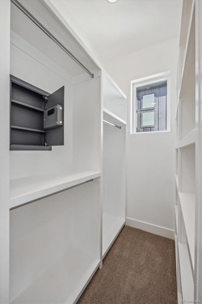 Primary Bedroom Walk-In Closet - Wall Safe