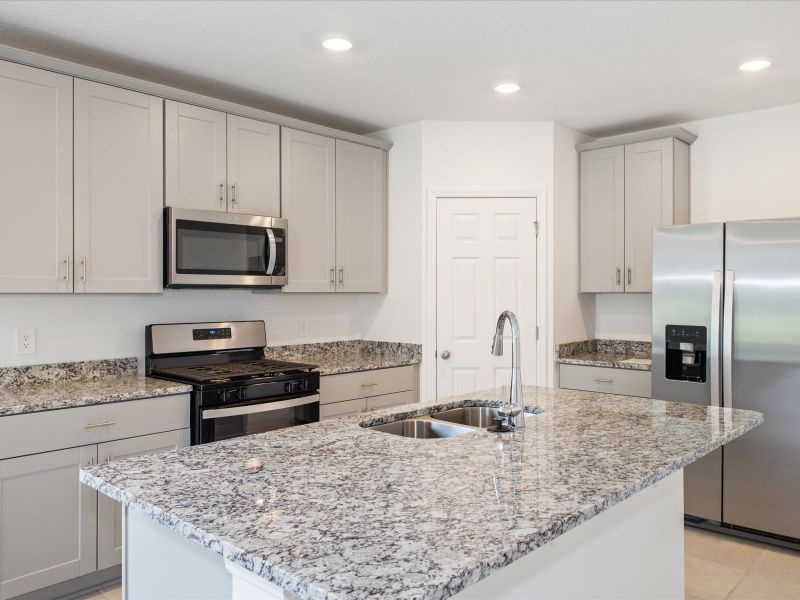 Kitchen in the Daphne floorplan at 5170 Minneola Lane