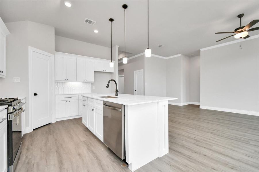 Open concept kitchen with kitchen island