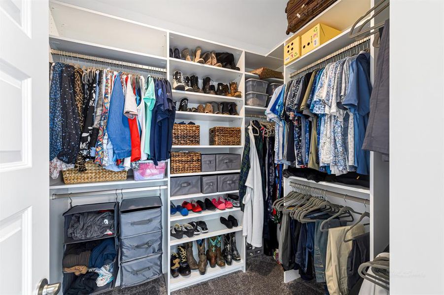 The custom built in closet system allows space for your wardrobe to stay neat and easily accessible.