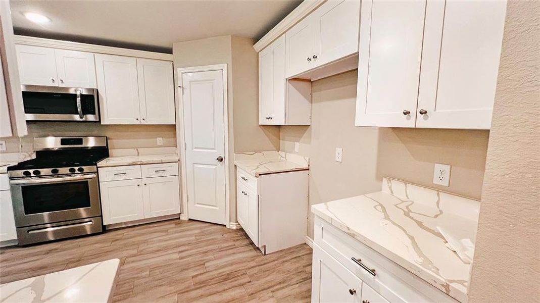 Kitchen with nice size pantry and cabinets