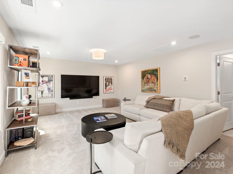 Second story recreational room with BLACK OUT shades for movie watching!