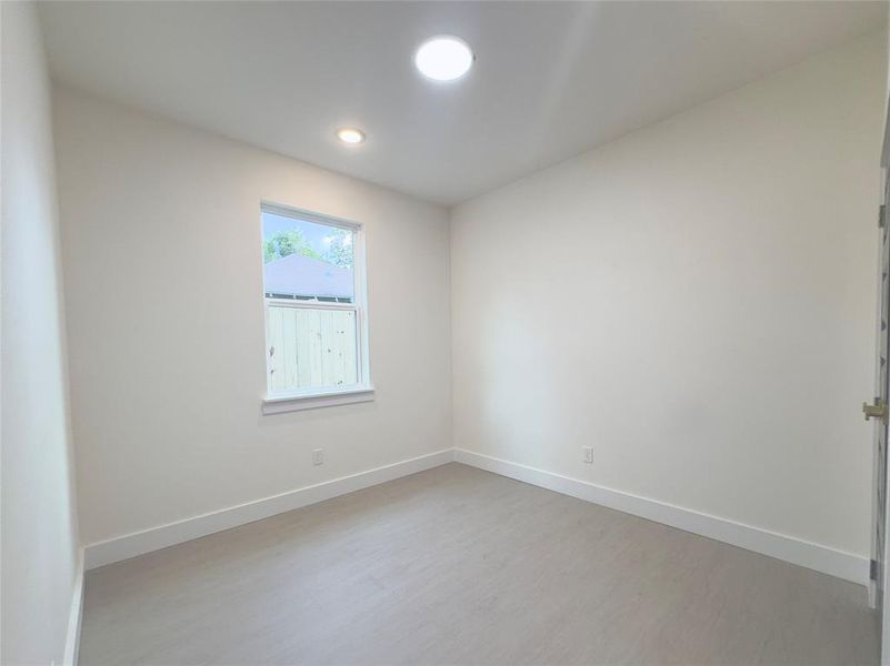 Spare room featuring light hardwood / wood-style floors