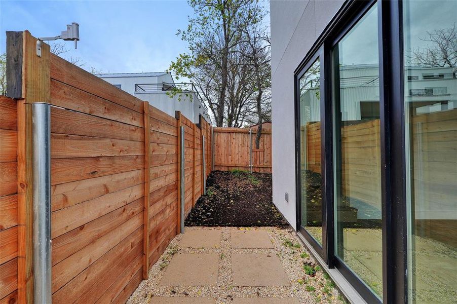 Sliding door off living room to side yard space