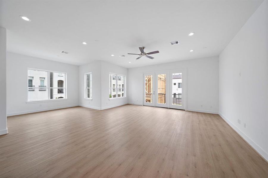 The huge dining/living area as seen from the kitchen.