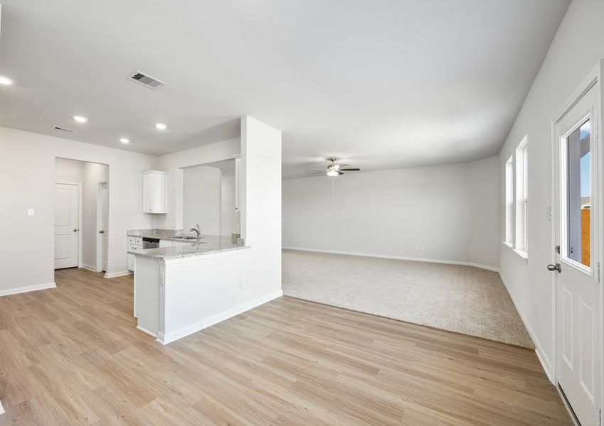 The kitchen is open to the dining room and spacious family room.