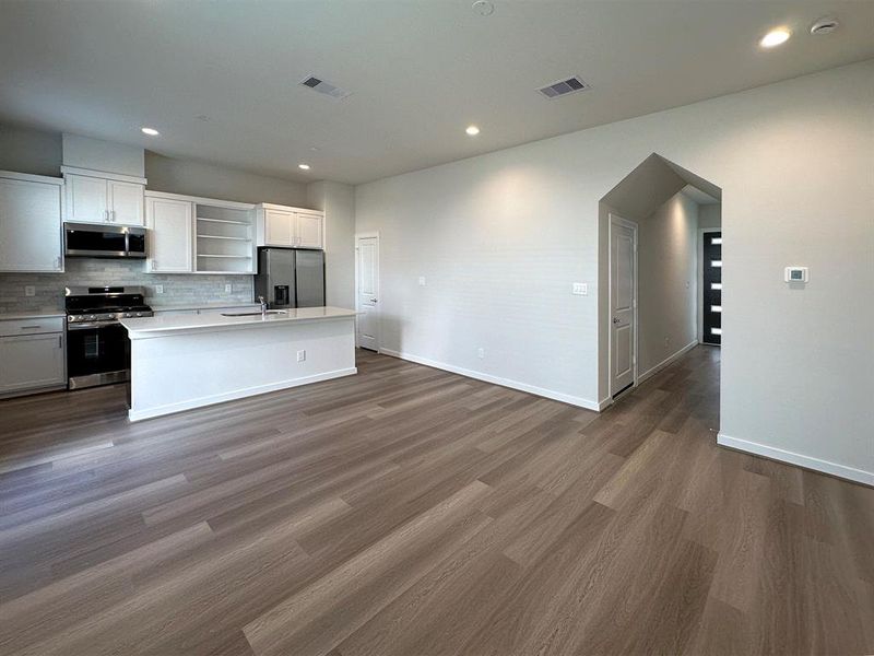 1st Floor - Living Room open to Kitchen.