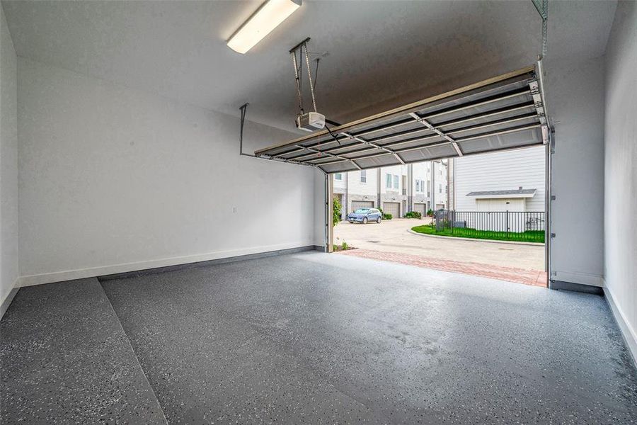 Two Car Attached Garage with floor epoxy.