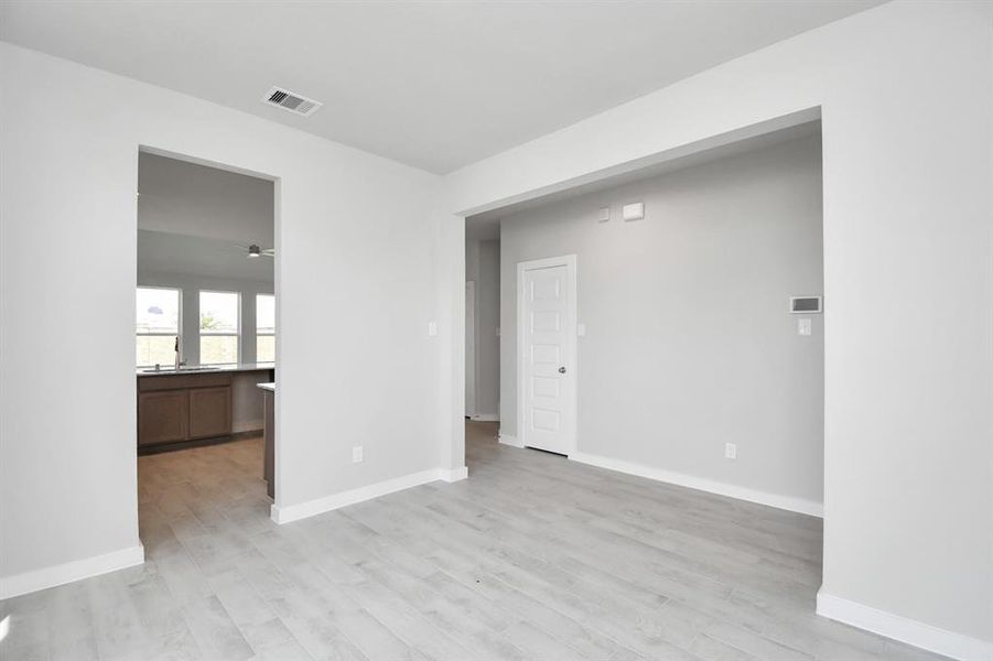 Another view of dining space. Photo shown is example of completed home with similar plan.