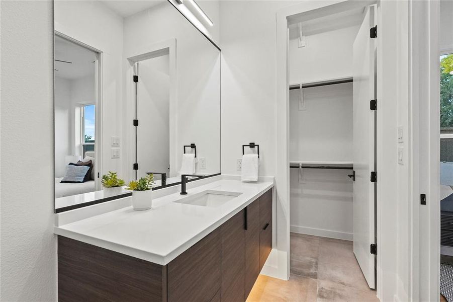 Bathroom with vanity and tile patterned floors