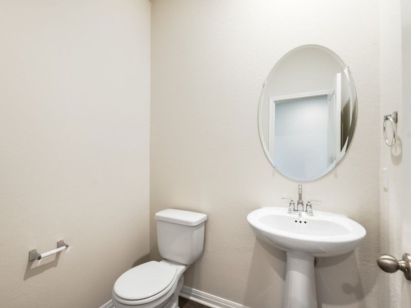 The convenient first-floor powder bathroom is great when hosting guests.