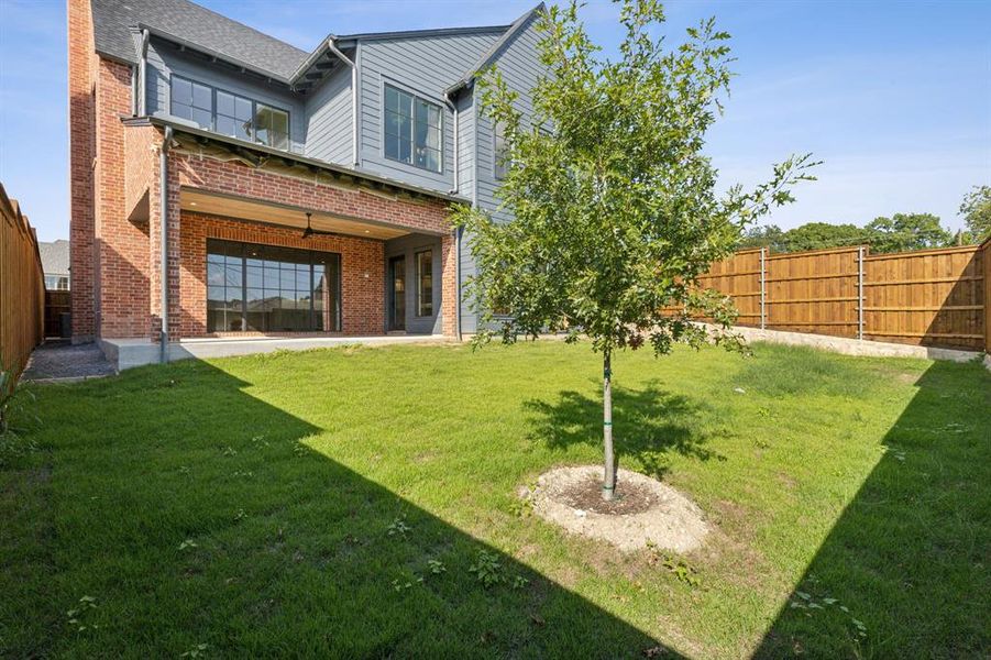 View of yard with a balcony and a patio area