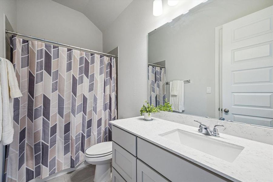 This bathroom offers privacy and convenience, allowing guests to feel comfortable and at home during their stay.