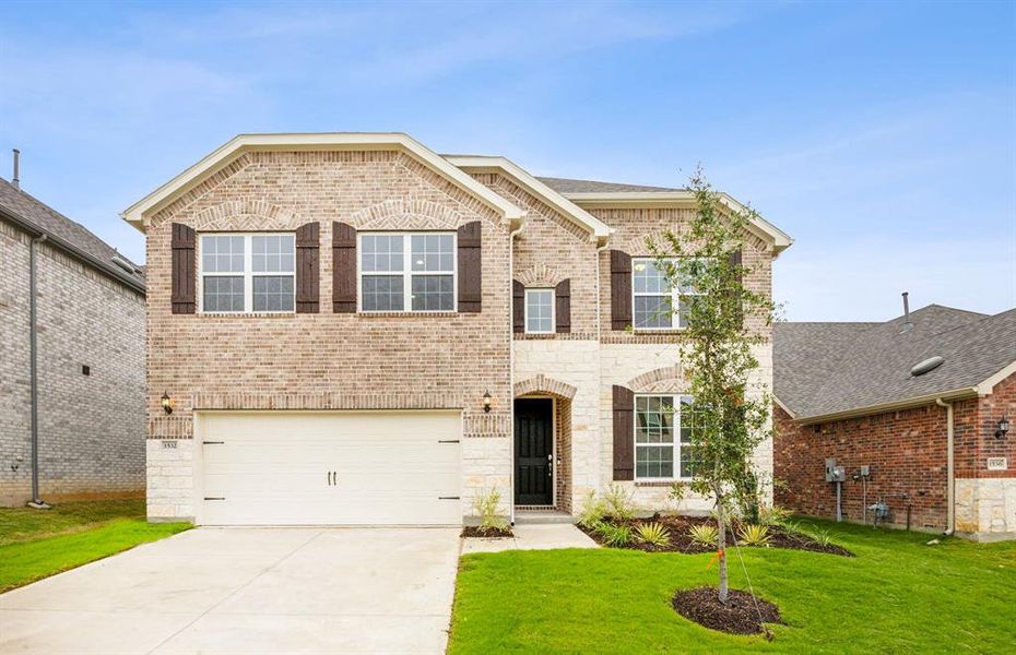 NEW CONSTRUCTION: Beautiful two-story home available at Wilson Creek Meadows in Celina