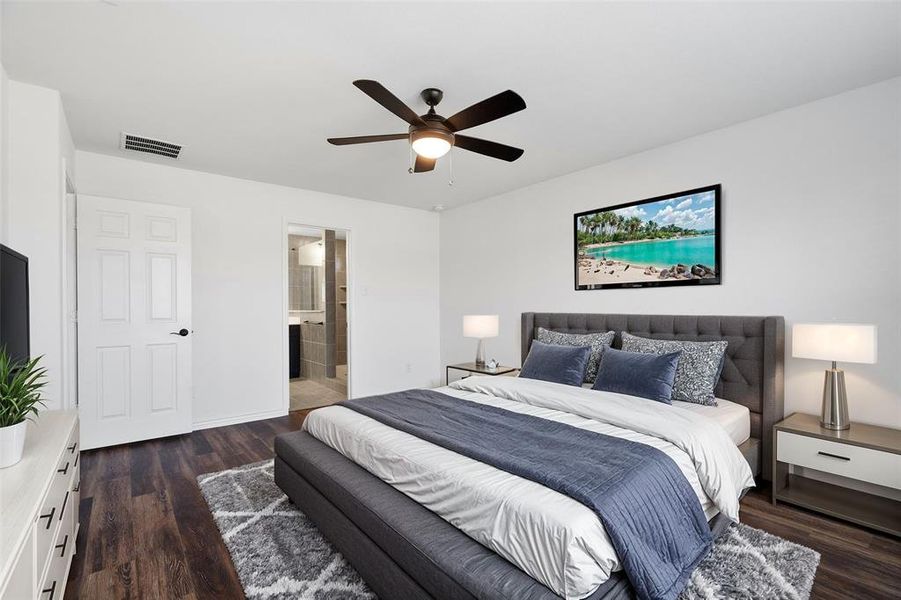 Virtually Staged Bedroom featuring ceiling fan, connected bathroom, and dark hardwood / wood-style floors