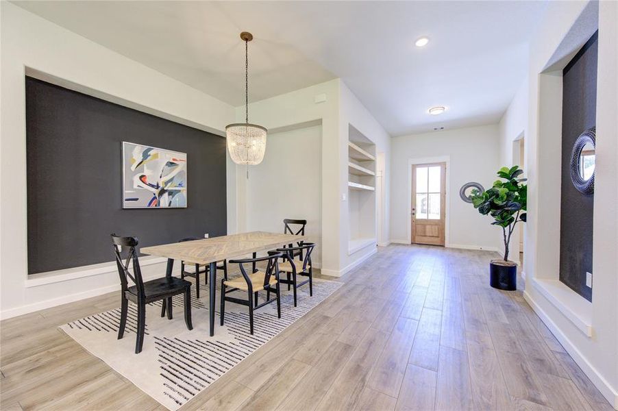 House is ready to move-in! Check out the beautiful combination of neutral colors in flooring, walls and accent walls.