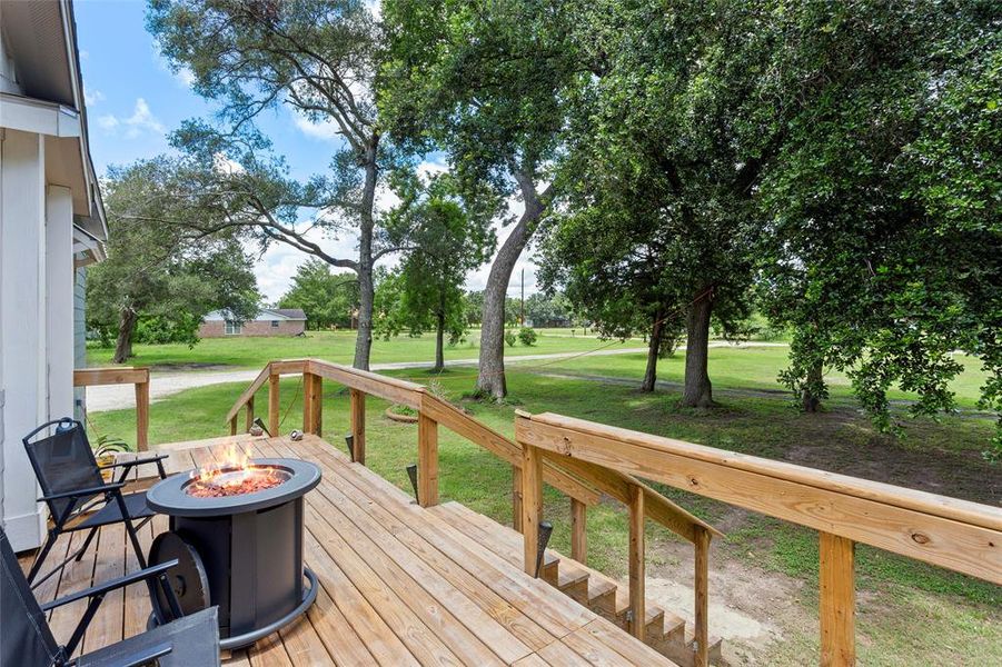 Such a lovely Patio for your enjoyment.  The current owners have hung lights in the trees out front for evening enjoyment plus set up a circular drive with a walkway