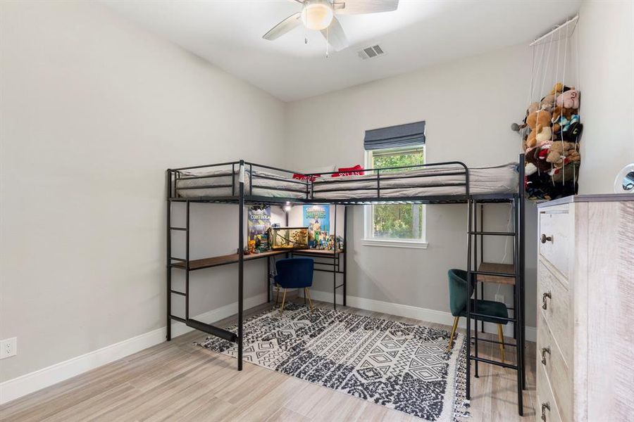 Bedroom #2 has an extra large closet, automatic blind, and tile floors.