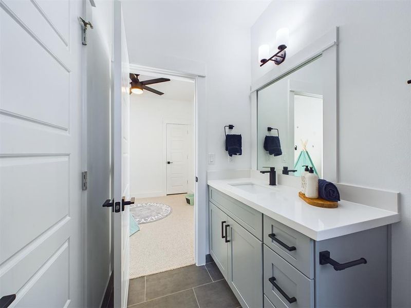 Jack & Jill bathroom connecting the secondary bedrooms.