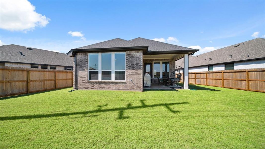 Sit back, relax and enjoy your gorgeous backyard while sitting under your large covered patio! This backyard offers plenty of privacy with NO back neighbors!