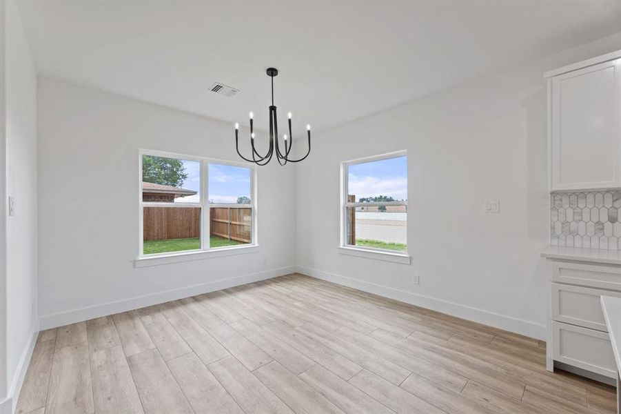 dining area featuring a chandelier