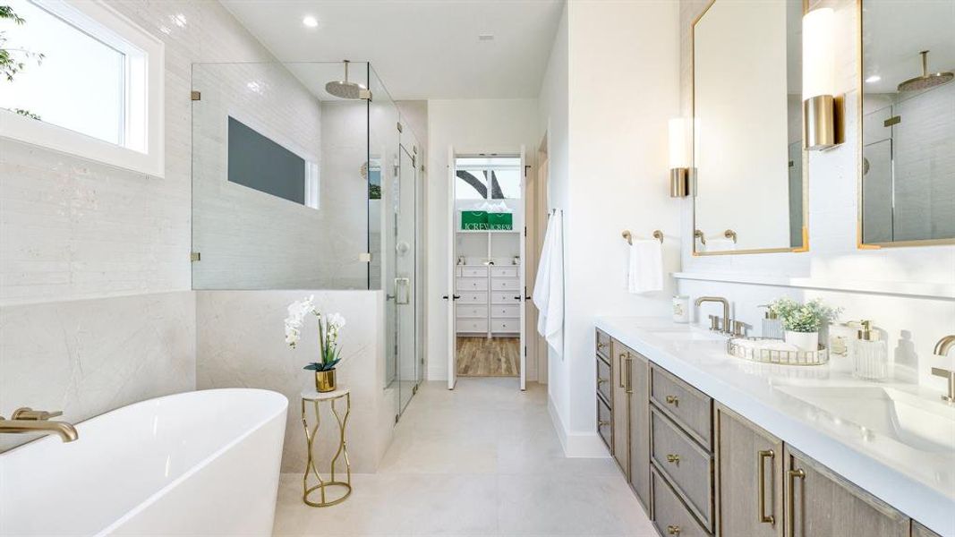 Bathroom with shower with separate bathtub, tile walls, dual bowl vanity, and tile patterned floors