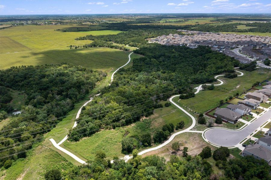 Community walking trail behind the property