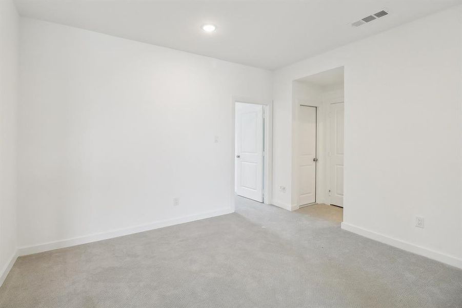 Unfurnished room featuring carpet floors