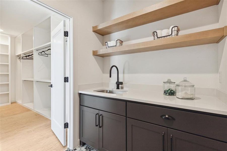 Laundry Room. Representative photo from a similar home completed by the builder, Homebound.