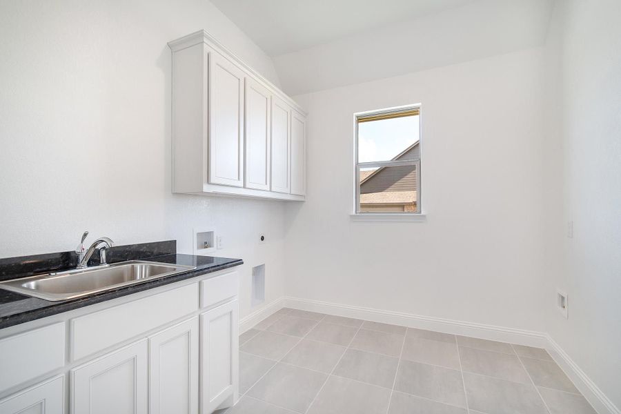 Laundry Room | Concept 3634 at The Meadows in Gunter, TX by Landsea Homes