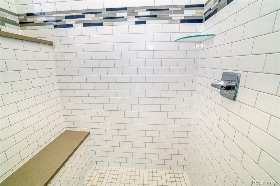 Primary bathroom shower with bench, prepped for Mr. Steam unit installation