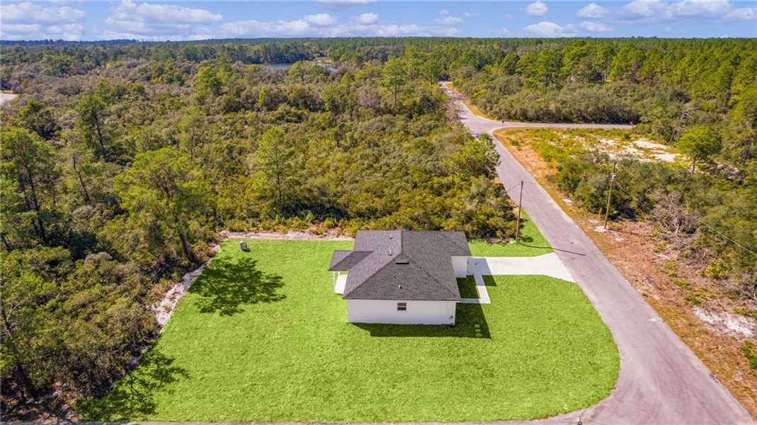 Good sized corner lot with Heather Lake at the end of the road