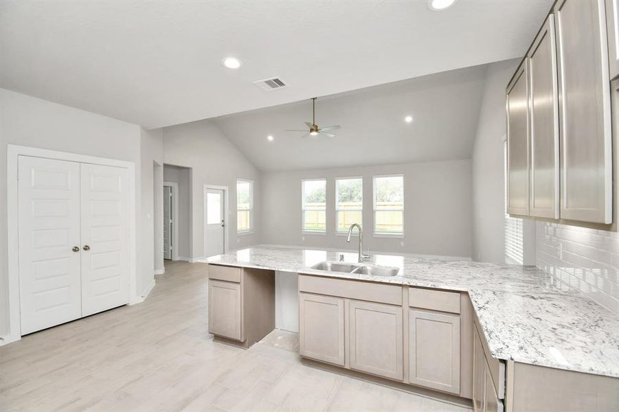 Step into the dream kitchen you've always wanted! Sample photo of completed home with similar floor plan. Actual colors and selections may vary.