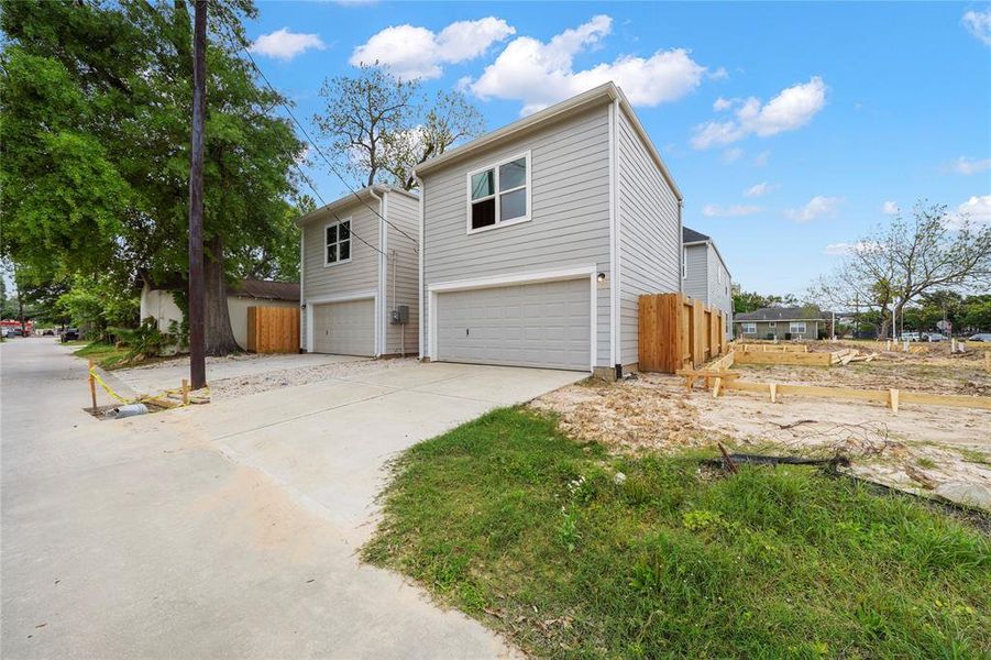 Detached garage with the option to finish out the garage. The garage also has alley access. (Sample photo of a completed Gibraltar Floor Plan.)