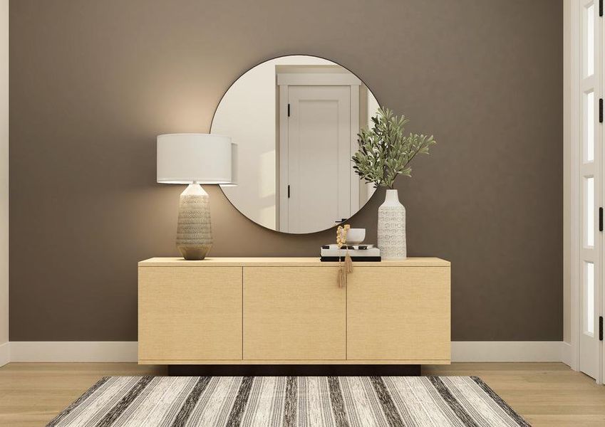 Rendering of foyer furnished with a light
  brown console and a round mirror.
