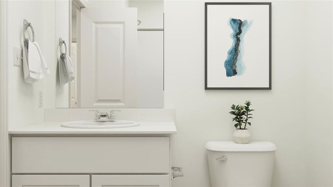 Bathroom with vanity and toilet