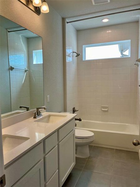 Upstairs secondary bath with double vanities