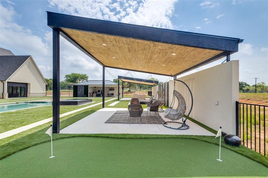 View of property's community featuring a patio and a pool