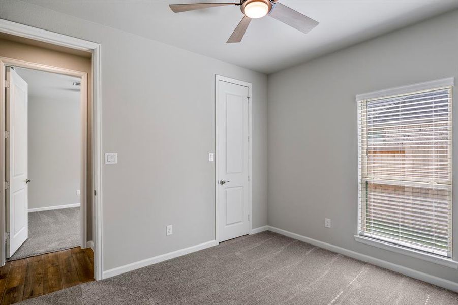 One of three secondary bedrooms