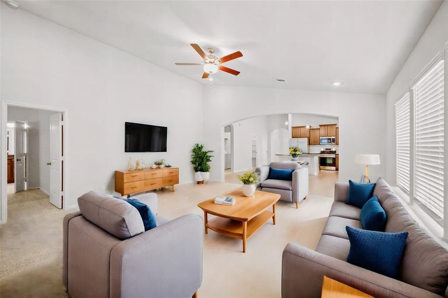 Welcome to this inviting open living area that seamlessly blends comfort and modern design. Bathed in natural light, the spacious layout features a versatile floor plan ideal for entertaining and everyday living.Virtually staged!