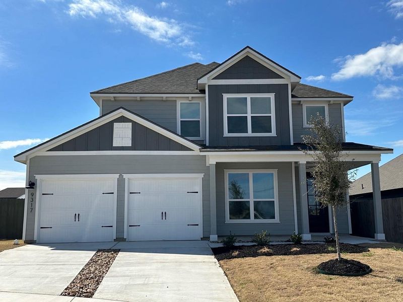 Ask about our interest rate specials, contact the Terrata Homes Model for more details!  Yoakum floor plan at 9317 Gladsome Path.